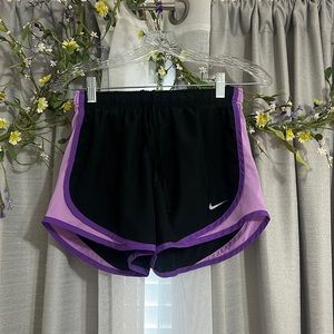 Purple and black nike shorts